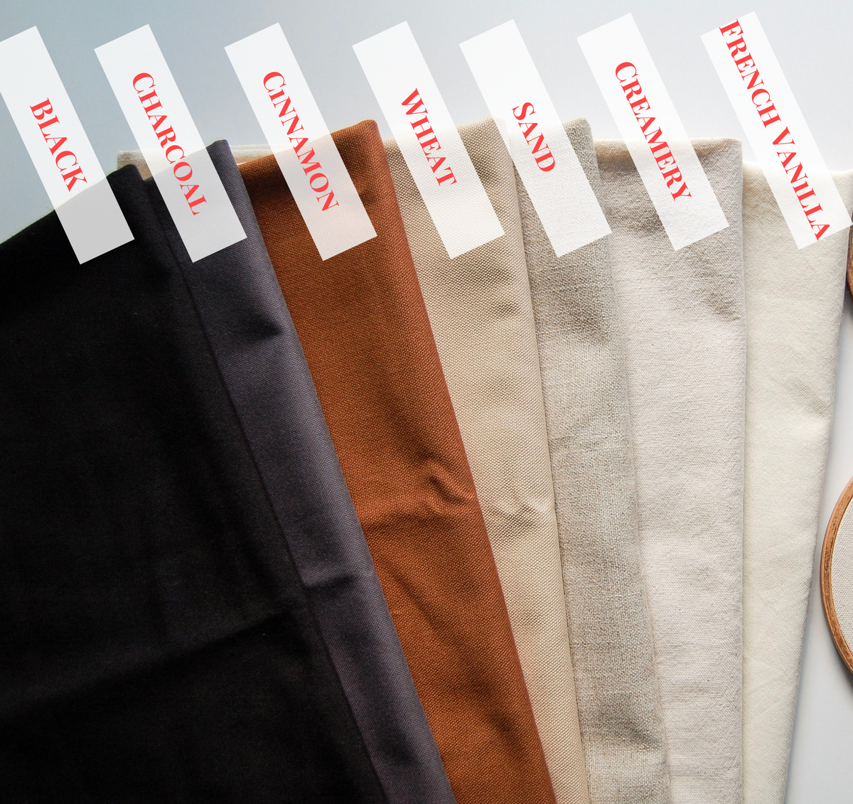 Seven embroidery fabric color options: Black, Charcoal, Cinnamon, Wheat, Sand, Creamery and French Vanilla