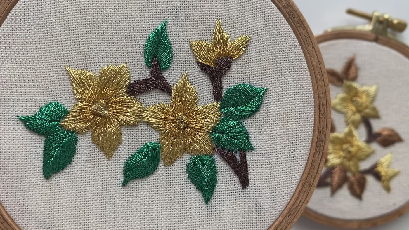 Video of the amber mini golden blooms hand embroidery in its hoop